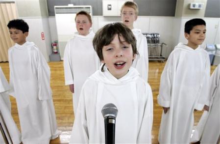 U.K. boys choir Libera soloist Michael Horncastle, foreground, and other members rehearse at a Tokyo studio Wednesday, Feb. 15, 2006 for their first live performance on a Japanese television Thursday in Tokyo. A total of seven boys among Libera members aged 7-16 who gather for several hours every week at a church in South London visited Japan for a five-day promotion tour. Members are from left: Joshua Madine, James Vereycken, Callum Payne and Thomas Cully. (AP Photo/Shizuo Kambayashi)
Height (pixels): 334
Width (pixels): 512
